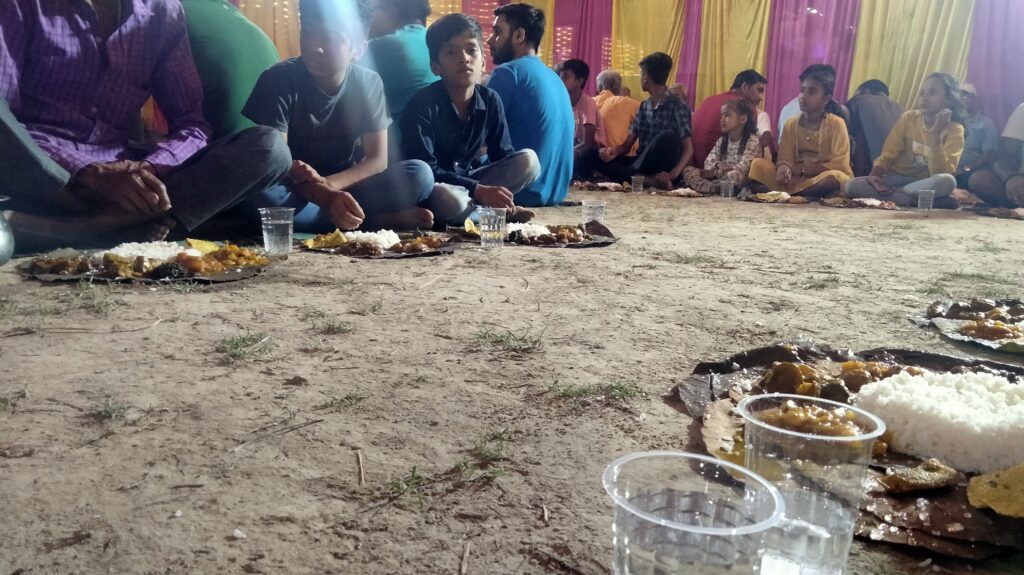 Indian family offering food to Brahmins during Shraddha